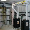 The two HTP boilers with the two 120 gallon SuperStor Ultra indirect water heaters in the background. 