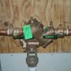 Watts 1 1/2 in backflow preventor, used to protect the public water supply from any chemical contaminants.